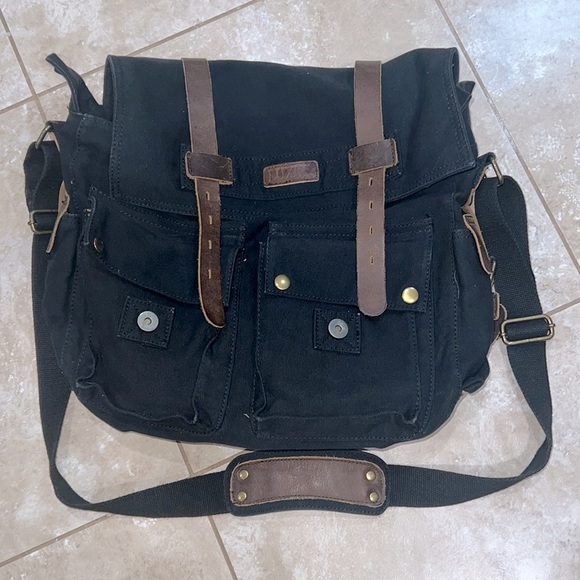 Canvas and Leather Messenger Bag.Color: Black